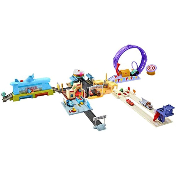 Disney and Pixar Cars On The Road Dinoco Rusteze Racing Center Playset with Lightning McQueen Toy Car, Launcher, Short Track and Spinning Pitty, Toy Gift for Kids, HGV69