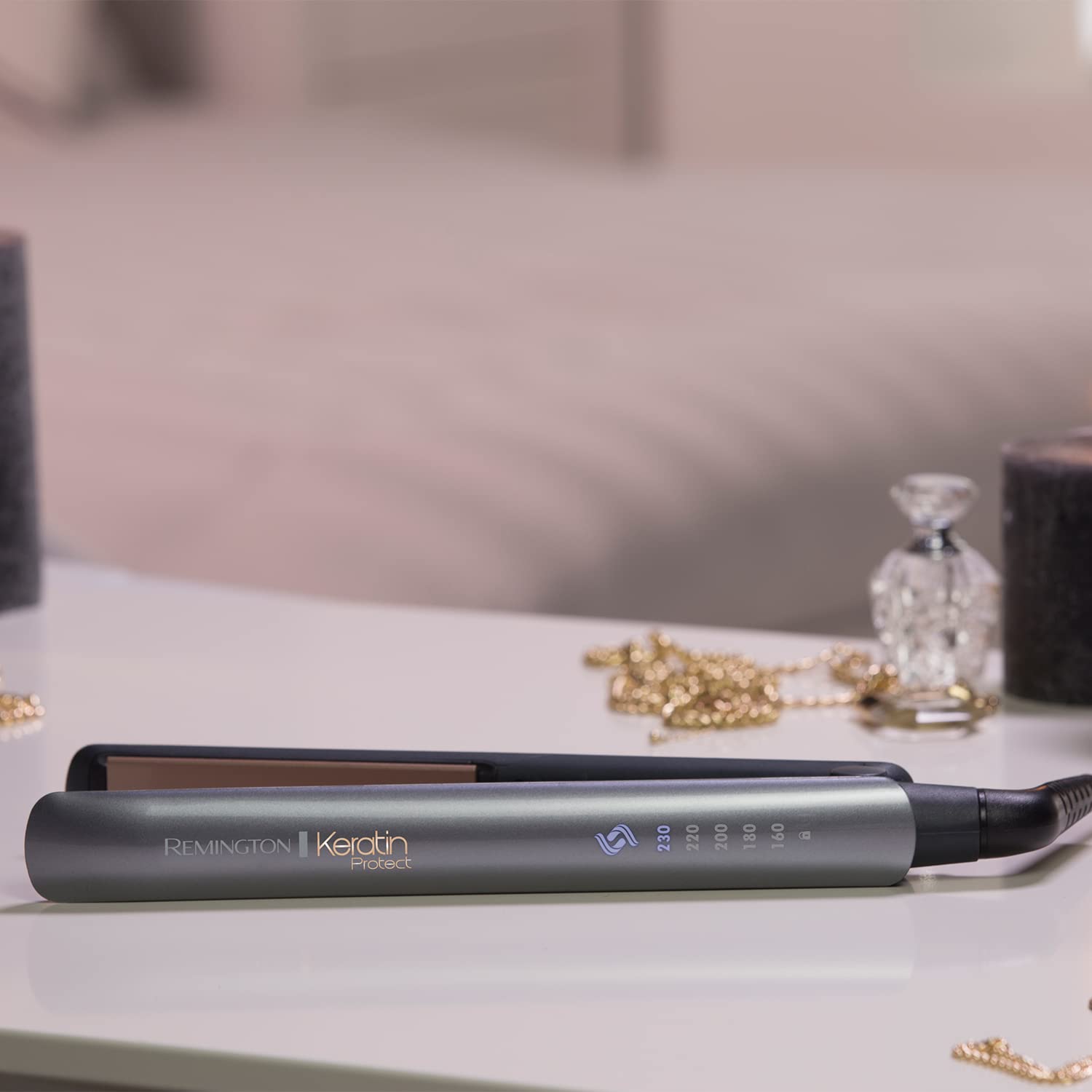 Remington Keratin Protect Intelligent Hair Straightener - Heat Sensor measures hair moisture levels and adapts to the optimum temperature - Plates are infused with Keratin & Almond oil, S8598