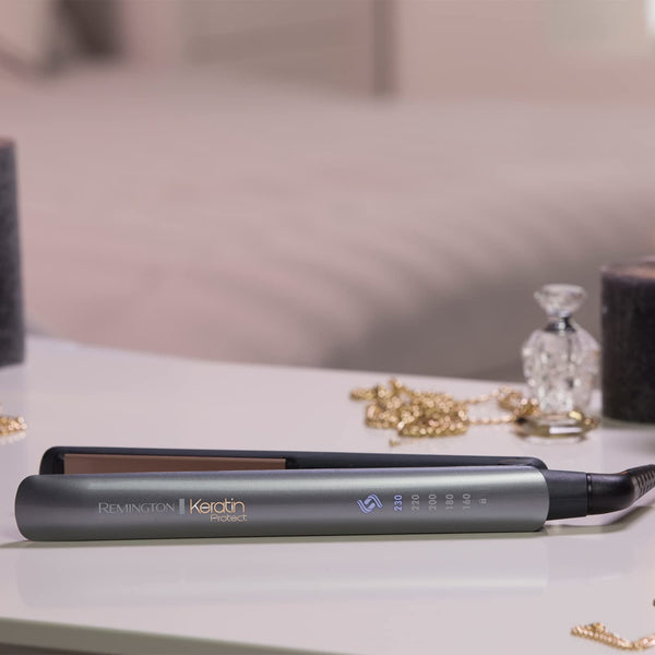 Remington Keratin Protect Intelligent Hair Straightener - Heat Sensor measures hair moisture levels and adapts to the optimum temperature - Plates are infused with Keratin & Almond oil, S8598