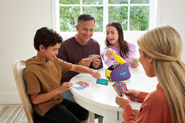 UNO Extreme Card Game Featuring Random-Action Launcher with Lights & Sounds & 112 Cards, Kid, Teen & Adult Game Night Gift Ages 7 Years & Older, GXY75