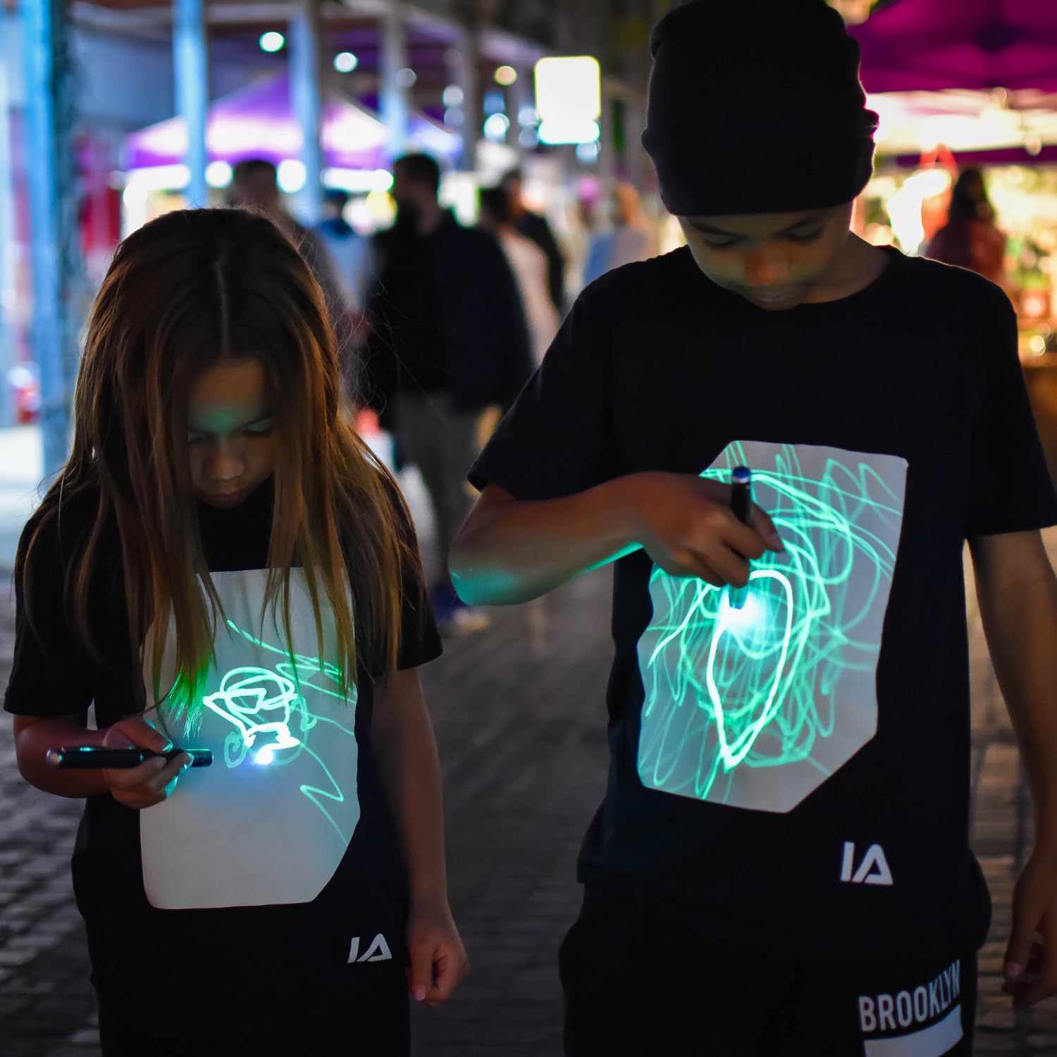 Illuminated Apparel Interactive Glow in The Dark T-Shirt - Fun for Birthday Parties & Festivals - Light up The Night