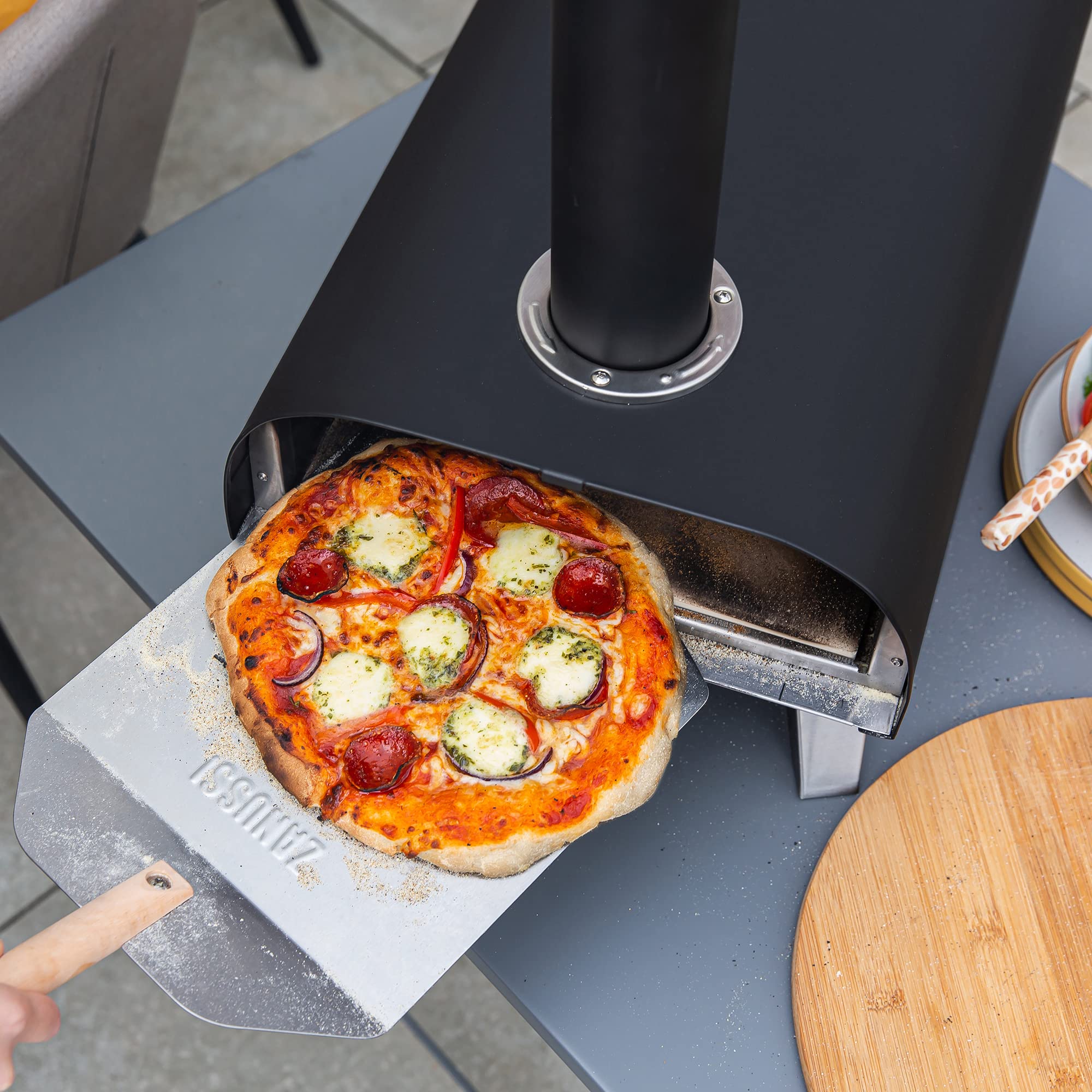 Zanussi ZPO1BPC Outdoor 12 Inch Wood Pellet Portable Wood Fired Pizza Oven with Paddle and Cover in Black, BBQ Oven & Smoker, Stainless Steel Foldable Legs