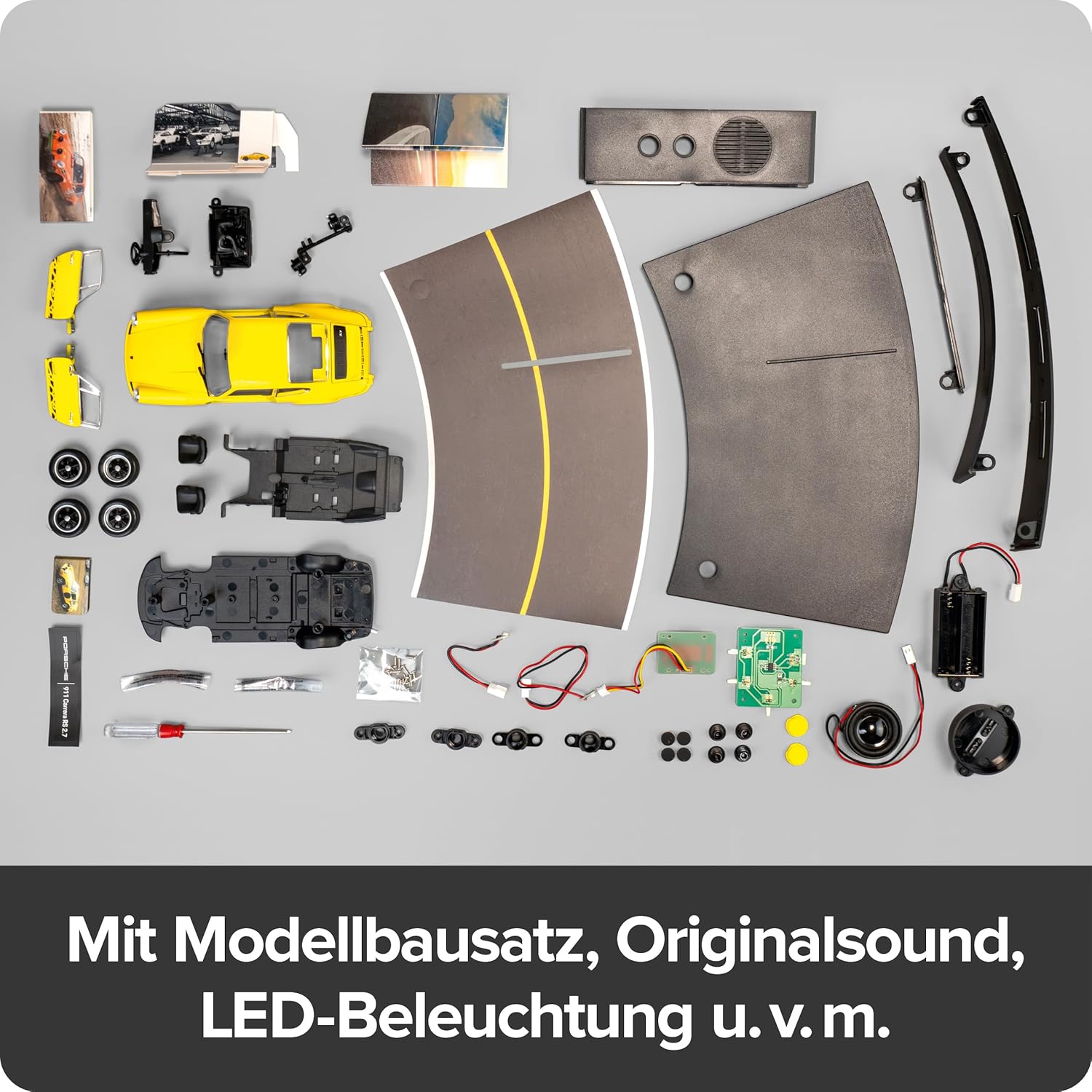 FRANZIS 67273 Porsche 911 Carrera RS 2.7 Advent Calendar Model Kit 1:24 Scale Including Sound Base and 52-Page Accompaniment Book