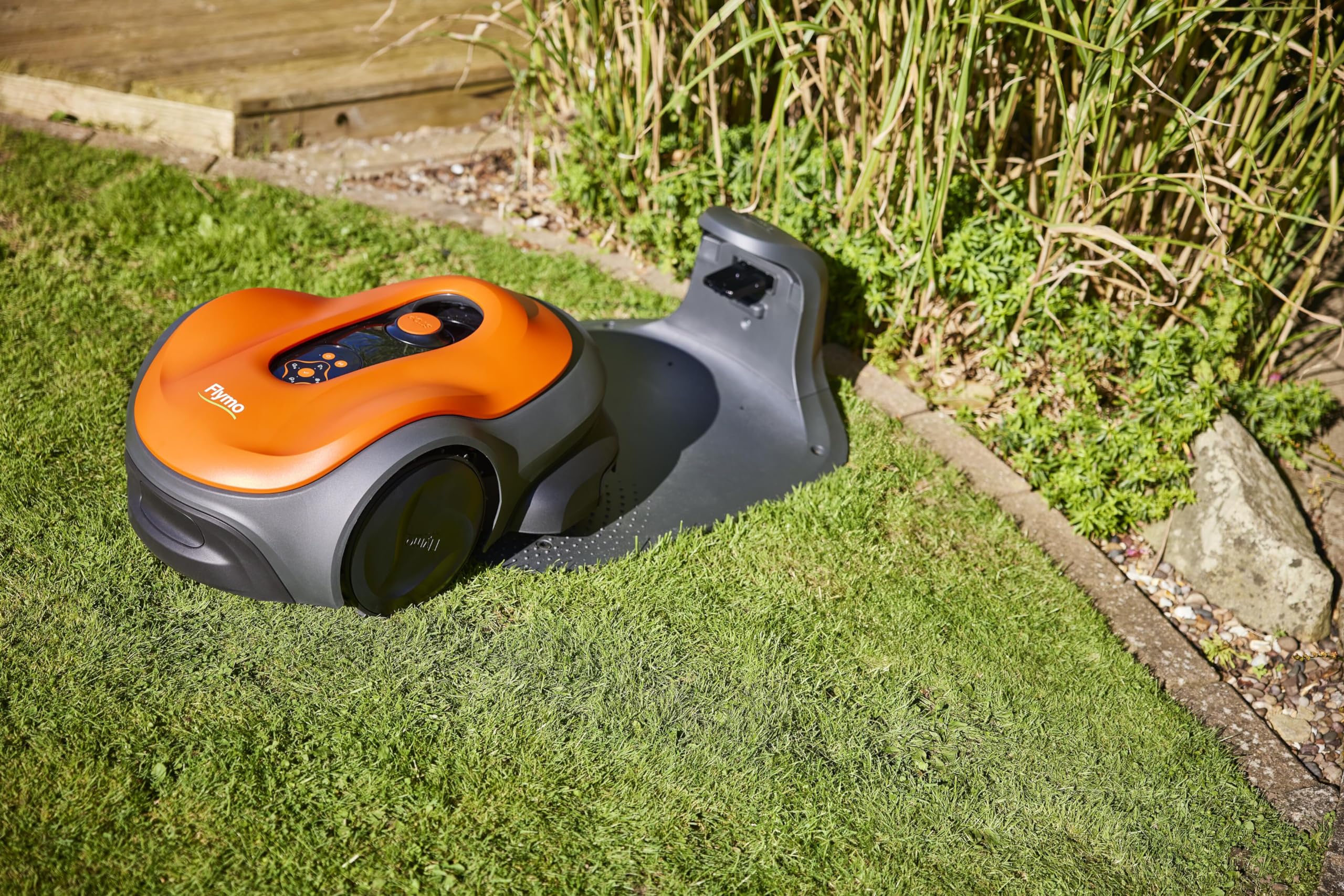 Flymo EasiLife 250 GO Robotic Lawn Mower - Cuts Up to 250 sq m, Ultra Quiet Mowing, Manicured Lawn, Bluetooth Application Control, Safety Sensors, Hose Washable, Lifestyle Functions, Orange and Grey